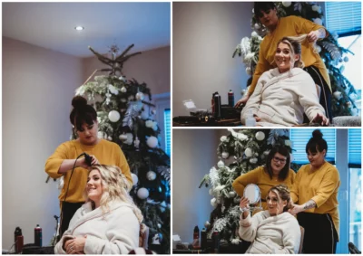 Hair styling session near decorated Christmas tree.