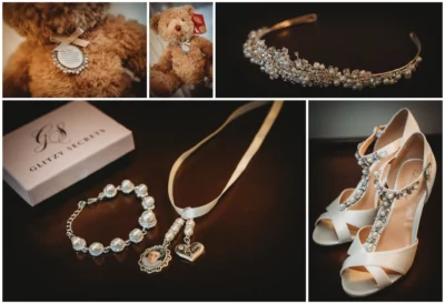 Bridal accessories and teddy bear on wooden surface.