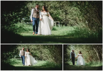 Bride and groom walking in sunny woodland setting.