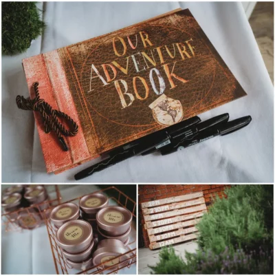 Adventure book with pens and wedding schedule sign.