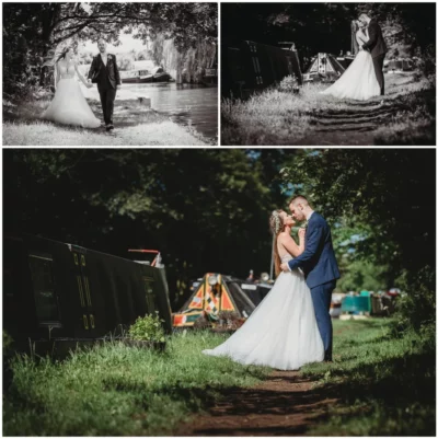 Bride and groom posing by canal with narrowboats
