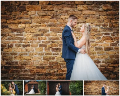 Bride and groom posing by stone wall.
