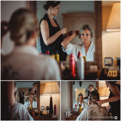 Bridal hair styling preparation in mirror reflection.