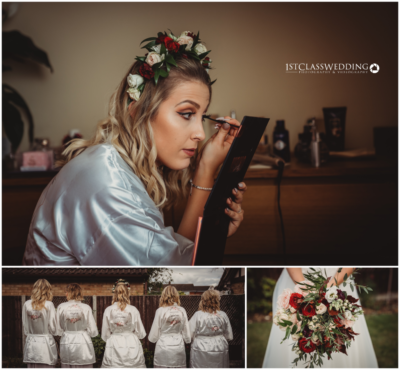 Bride in floral headpiece applying makeup; bridesmaids' robes; wedding bouquet.