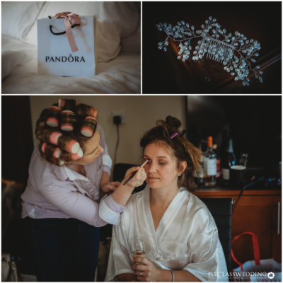 Bridal preparation with Pandora gift, hairpins, and makeup application.