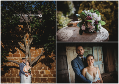 Wedding couple with bridal bouquet, rustic backdrop.