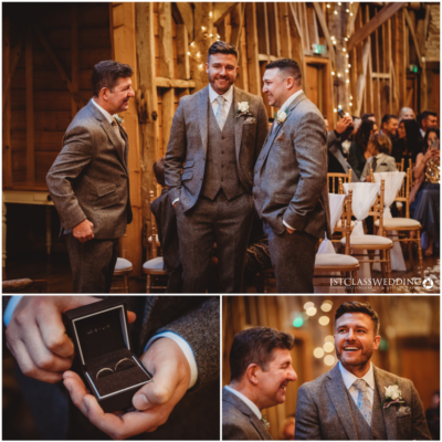 Men in suits at wedding, holding ring box.