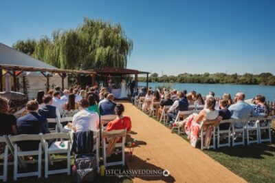 Outdoor wedding ceremony by the lake