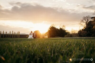 Couple in sunset wedding photo outdoors.