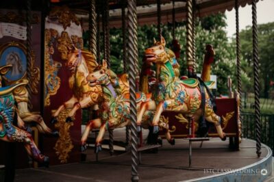 Colourful carousel horses at an amusement park.