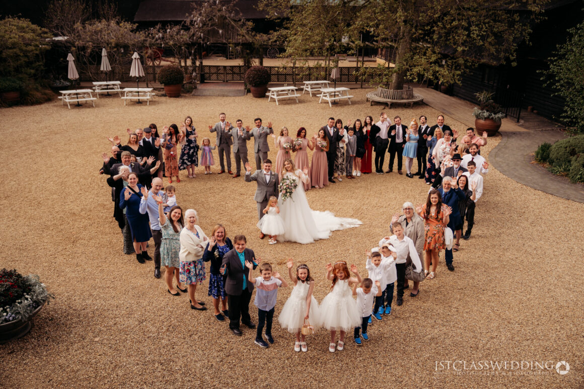 heart shaped group photo at south farm wedding venue