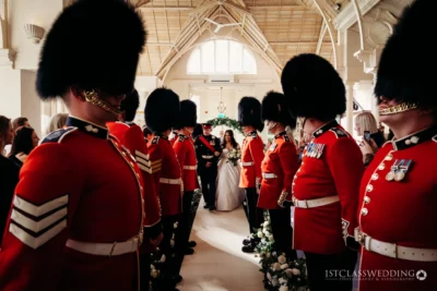Guards in uniform at wedding ceremony.