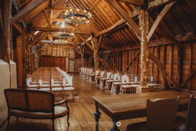 Rustic barn wedding venue with fairy lights.