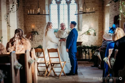 Wedding ceremony inside a stone church