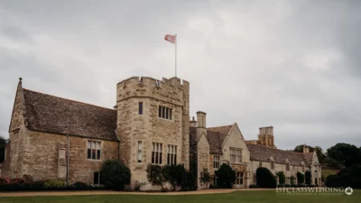 Historic stone castle with flag in England.