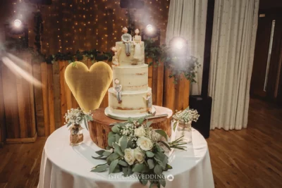 Wedding cake with heart decoration and fairy lights