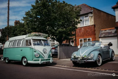 Vintage Volkswagen bus and Beetle at wedding event