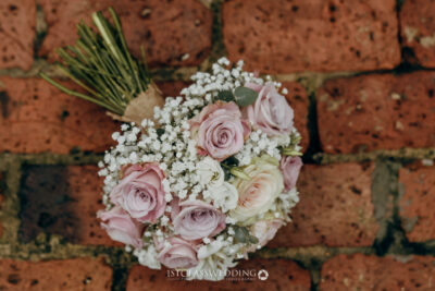 Bridal bouquet on brick background.