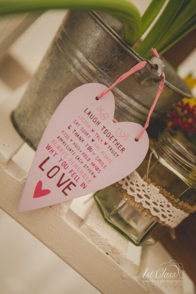 Heart-shaped love advice hanging decoration.