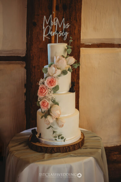 Elegant tiered wedding cake with floral decoration