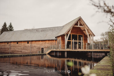 Rustic lakeside wedding venue with reflection