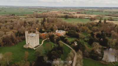 Aerial view of historic estate and gardens in countryside at Hedingham Castle