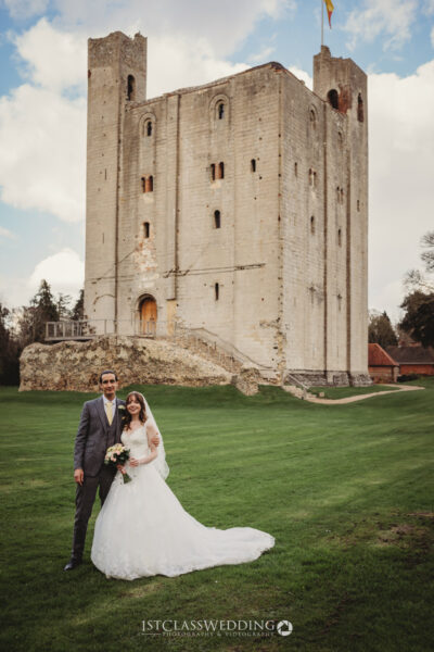 Couple at castle wedding venueat Hedingham Castle.
