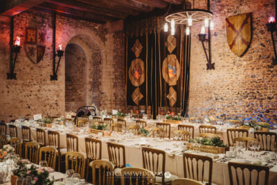 Elegant medieval banquet hall set for wedding reception.